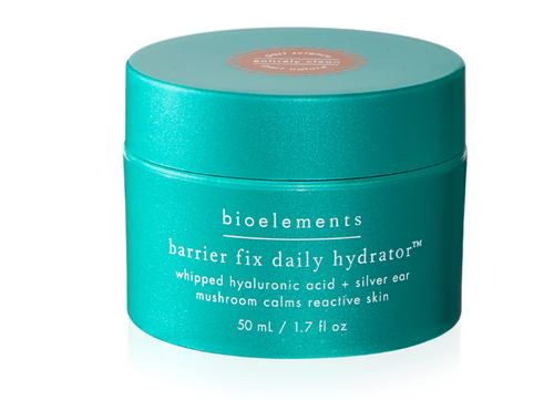 Turquoise jar of bioelements barrier fix daily hydrator on a white background