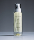 Bottle of Epicutis oil cleanser on a reflective surface with a gray background