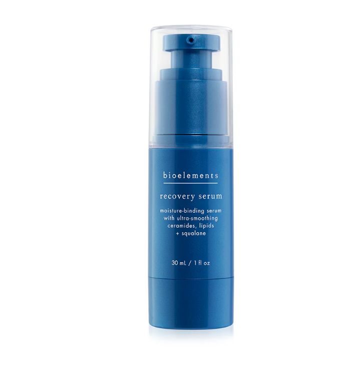 Blue serum bottle with 'bioelements' branding on a white background