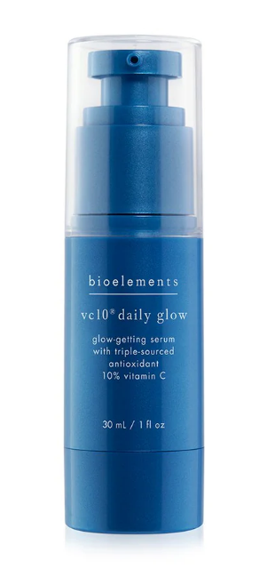 Blue serum bottle with a clear cap on a white background